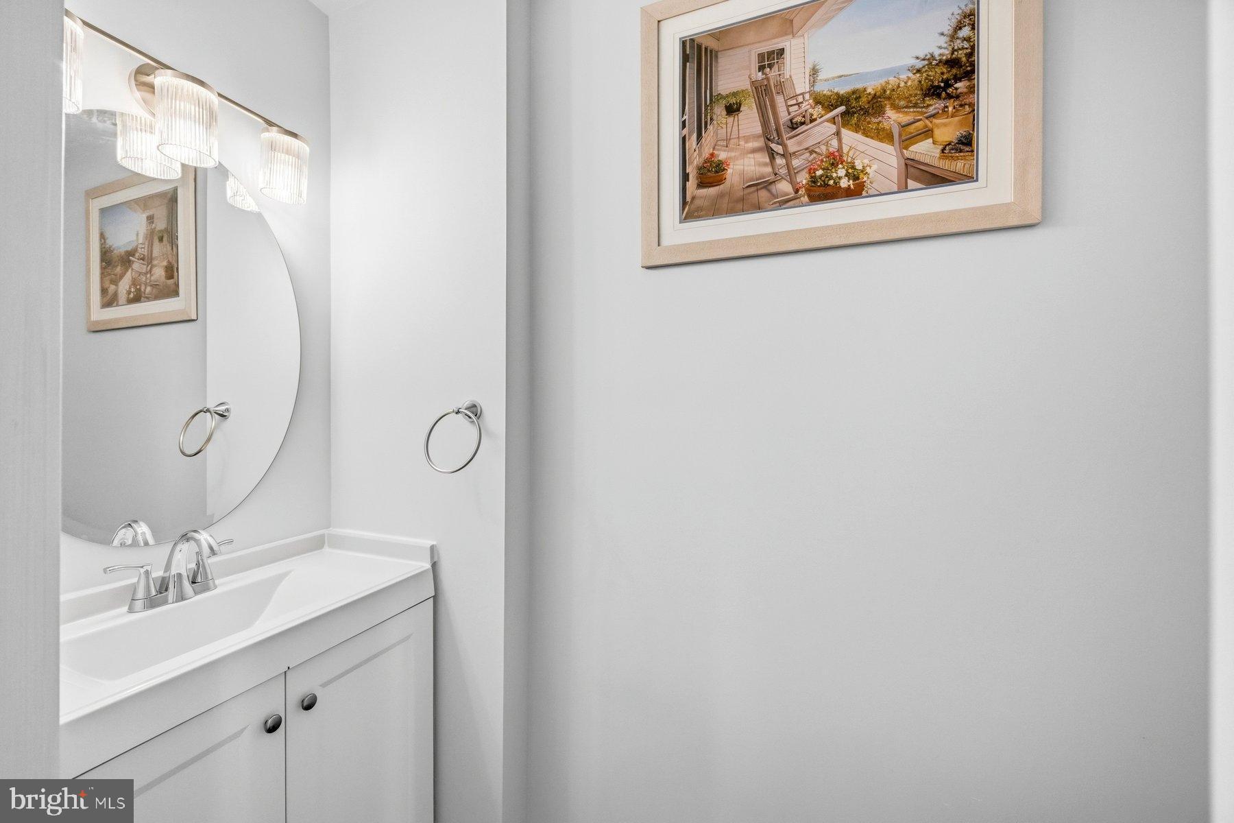 58 Hardwood Drive Rosedale, MD 21237 - Photo 16 of 38 Bright powder room with modern touches.