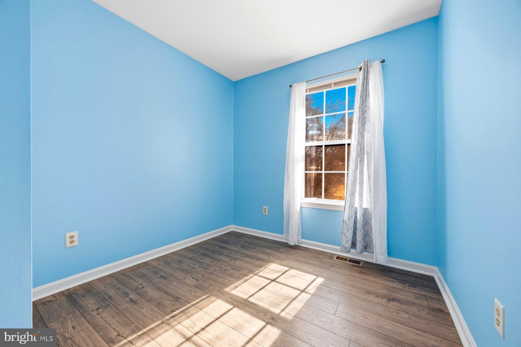 58 Hardwood Drive Rosedale, MD 21237 - Photo 23 of 38 Bright blue room with natural light.