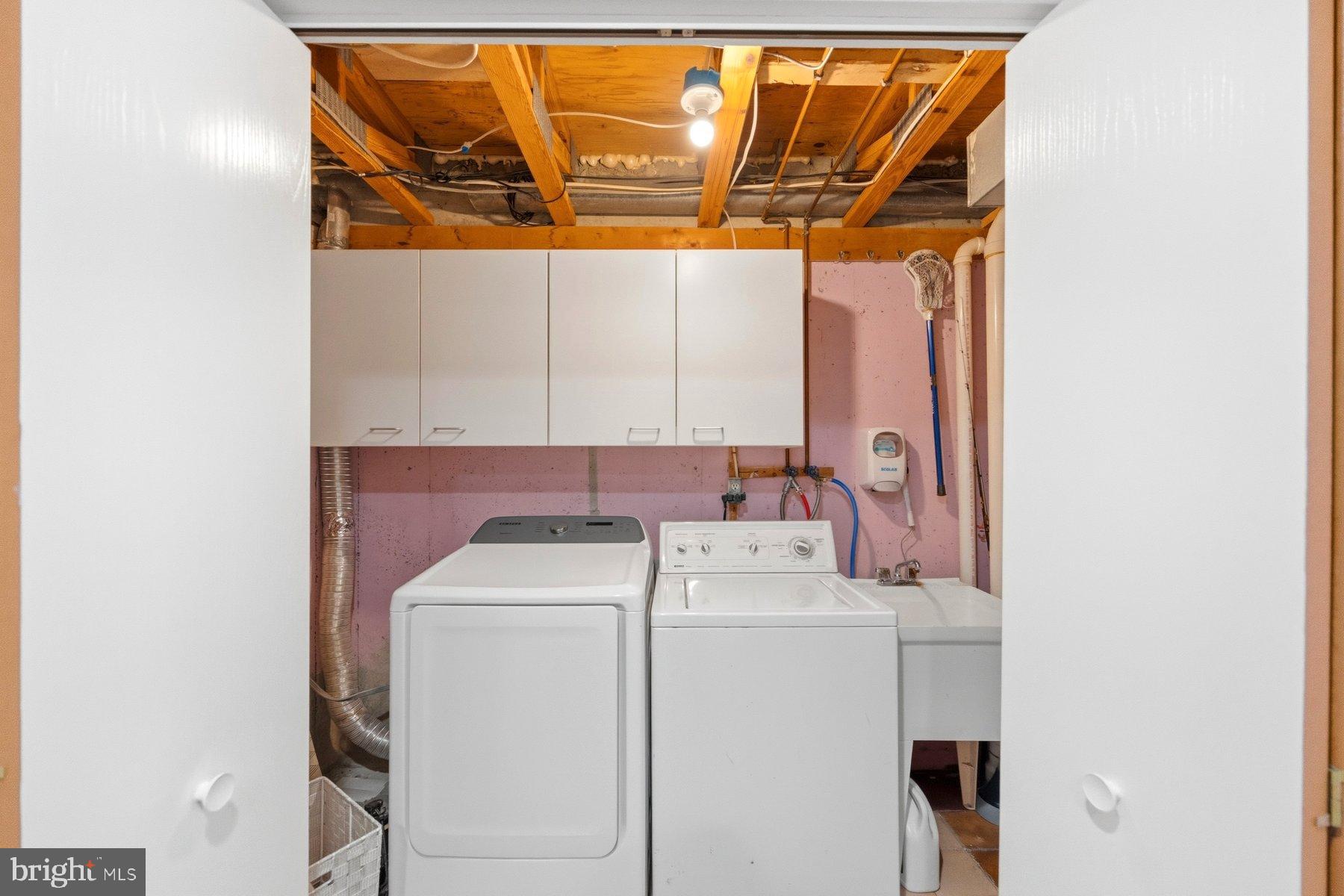 58 Hardwood Drive Rosedale, MD 21237 - Photo 32 of 38 Functional laundry space with ample storage.