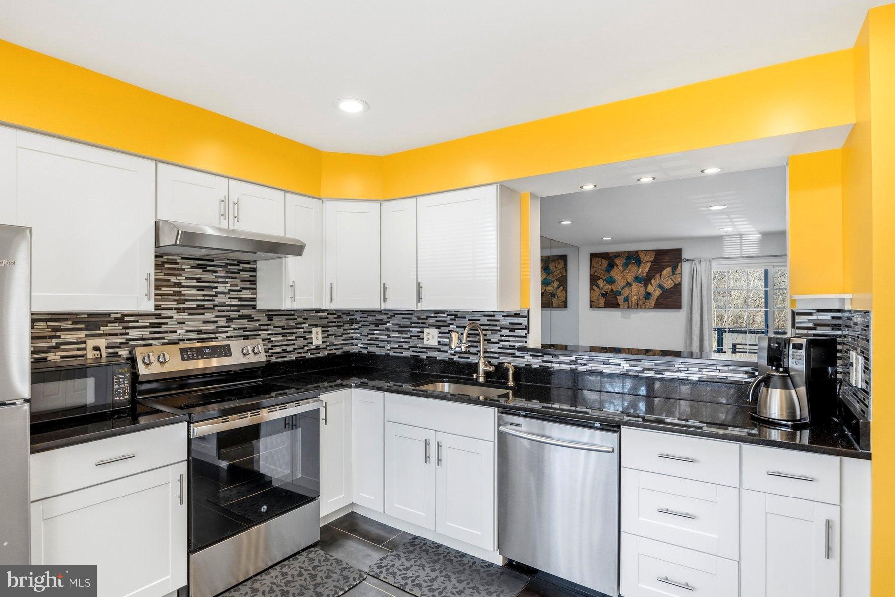 58 Hardwood Drive Rosedale, MD 21237 - Photo 7 of 38 Vibrant kitchen with modern finishes.