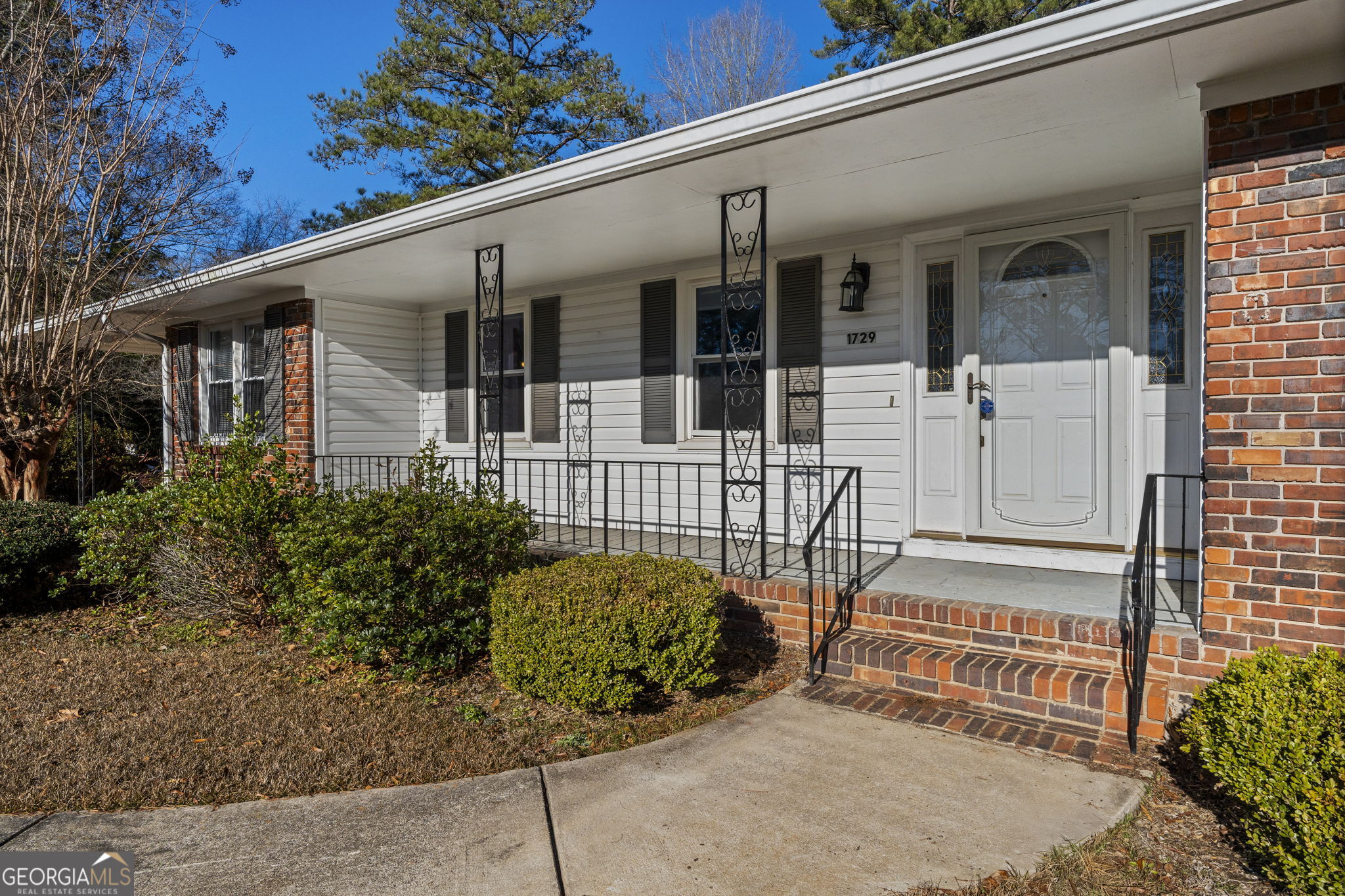 1729 Milton Way Perry, GA 31069 - Photo 2 of 41 a view of a chair and table in the balcony