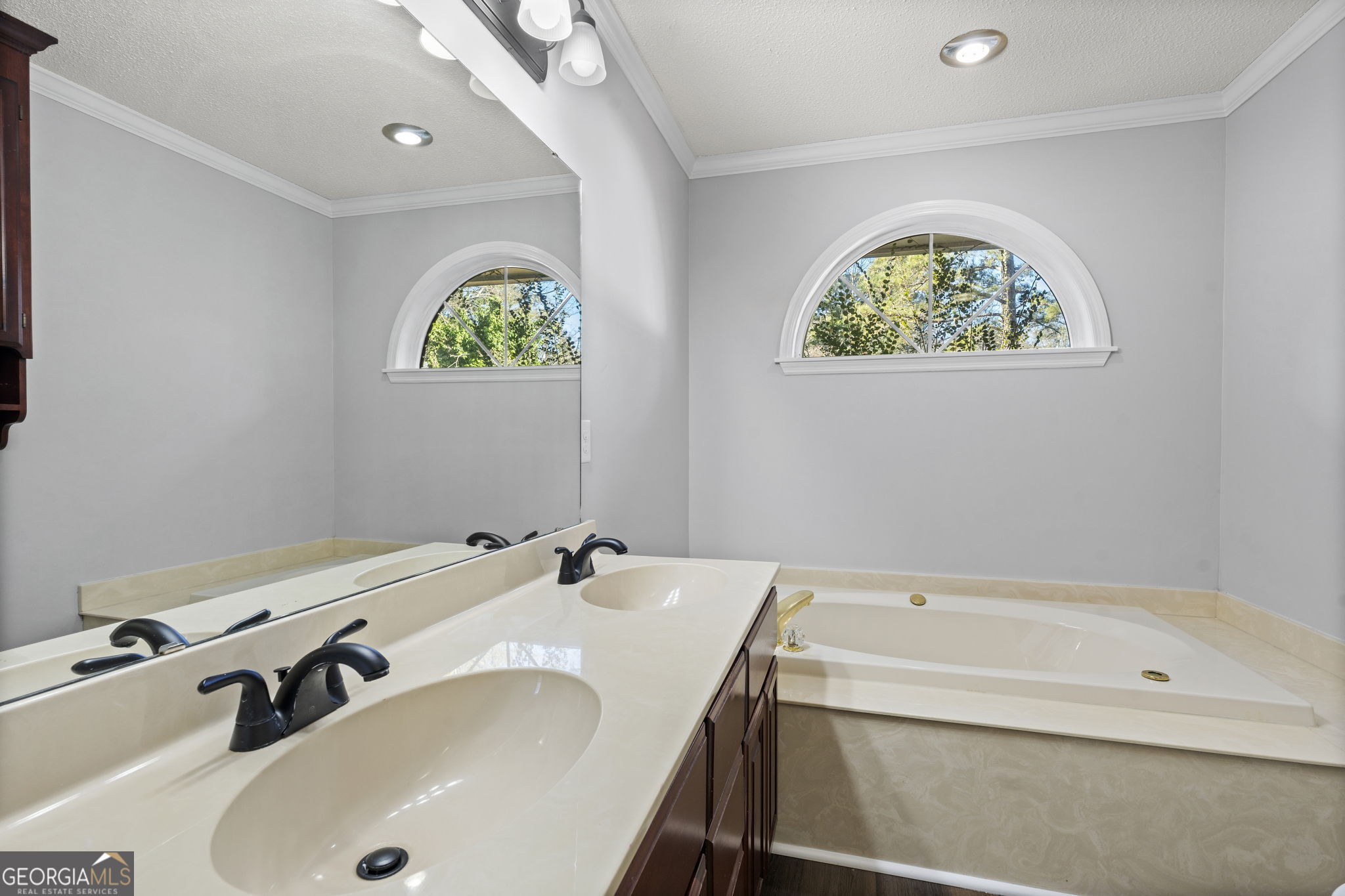 1729 Milton Way Perry, GA 31069 - Photo 24 of 41 a bathroom with a sink and a bathtub