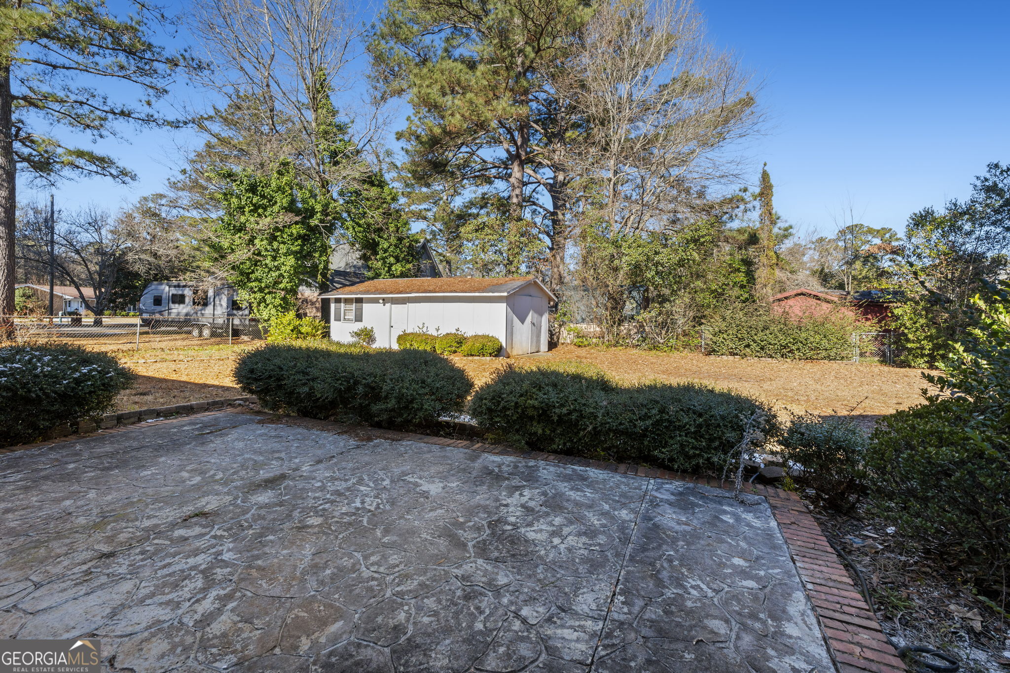 1729 Milton Way Perry, GA 31069 - Photo 37 of 41 a view of a yard with plants and trees