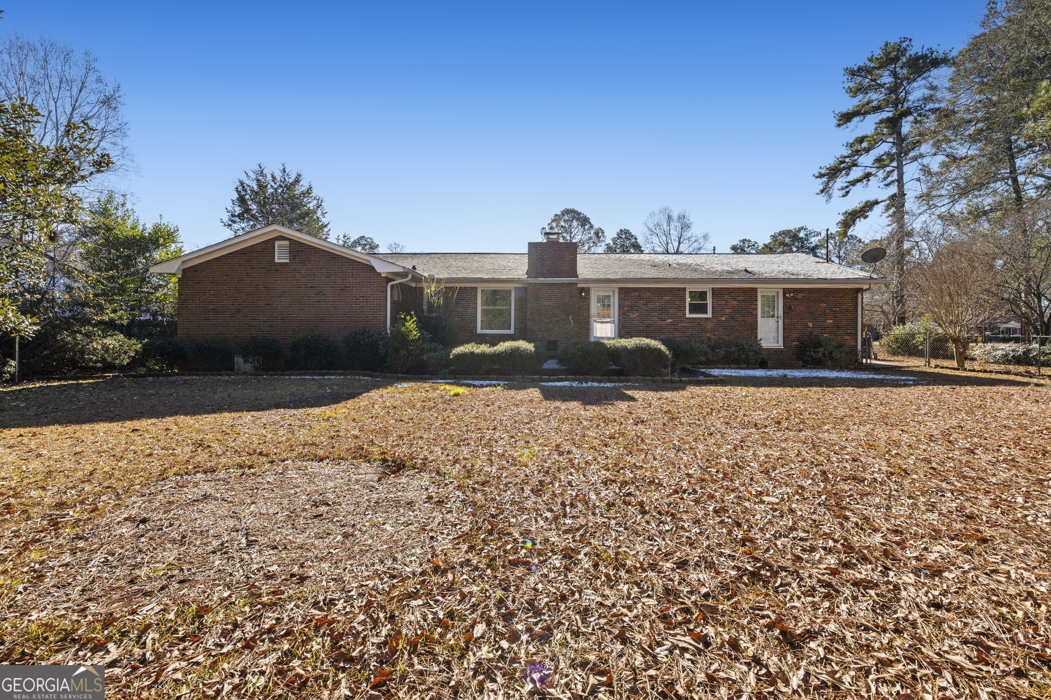 1729 Milton Way Perry, GA 31069 - Photo 39 of 41 a front view of a house with a yard