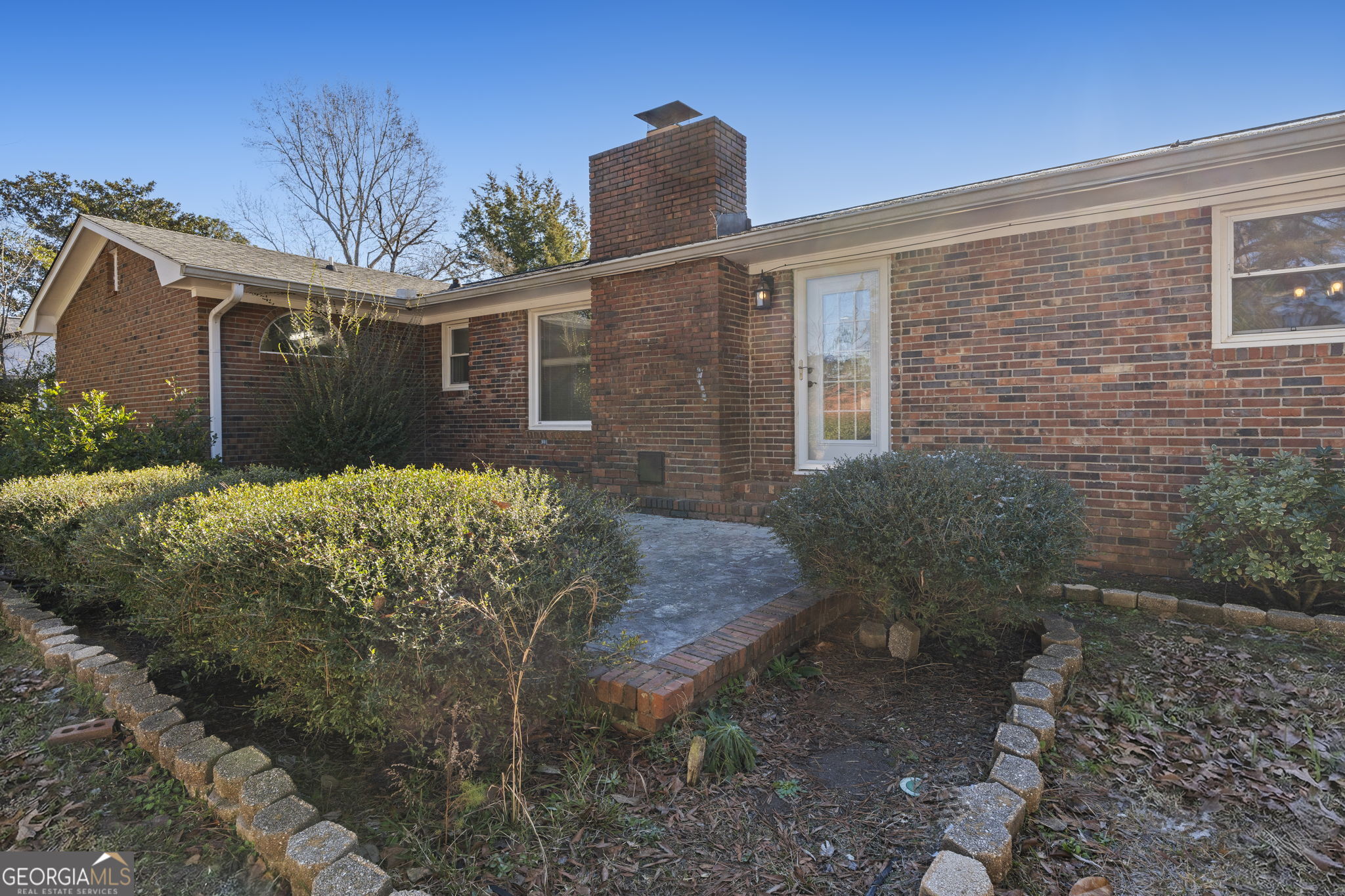 1729 Milton Way Perry, GA 31069 - Photo 40 of 41 a front view of a house with garden