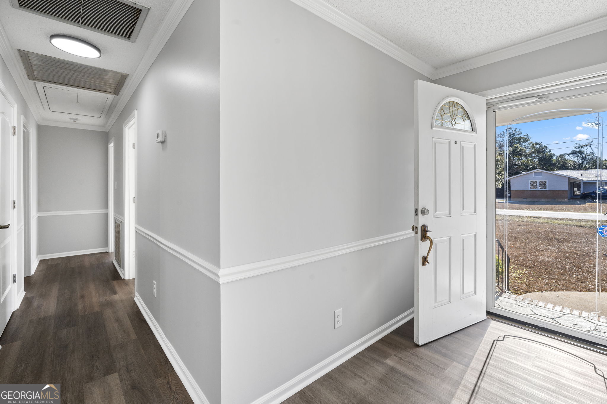 1729 Milton Way Perry, GA 31069 - Photo 8 of 41 a view of a hallway with wooden floor and entryway