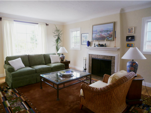 209 Channing Road Burlingame, CA 94010 - Photo 4 of 25 a living room with furniture and a fireplace
