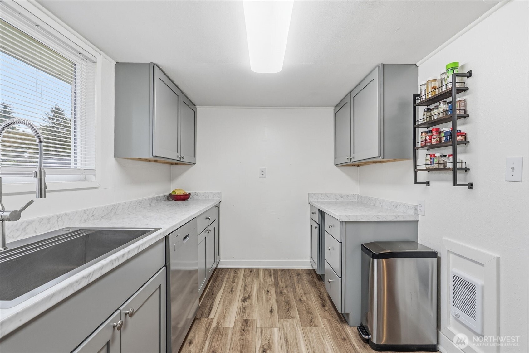 180 2nd Street Cathlamet, WA 98612 - Photo 20 of 40 a kitchen with a sink stove and cabinets
