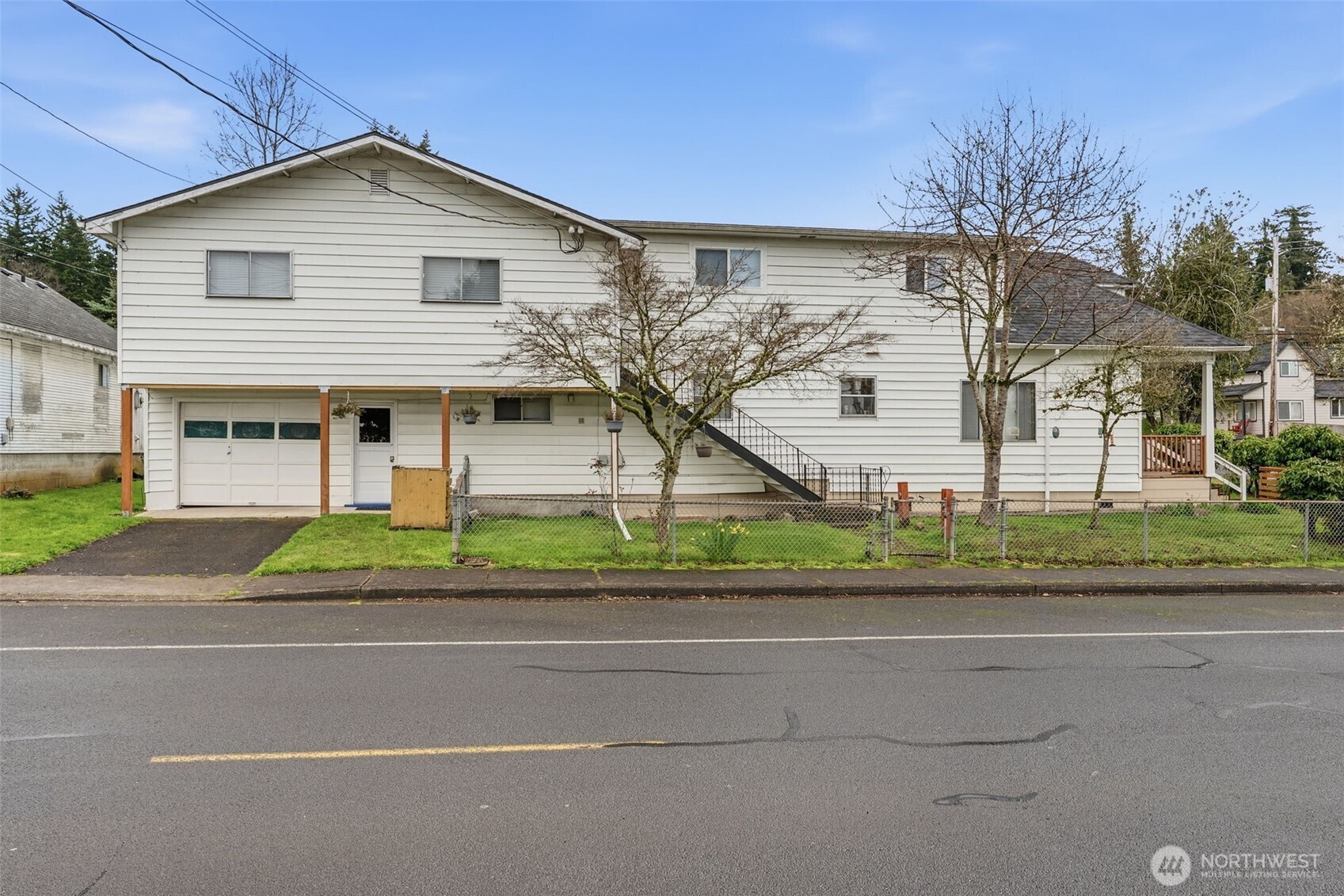 180 2nd Street Cathlamet, WA 98612 - Photo 2 of 40 a front view of house with yard and green space