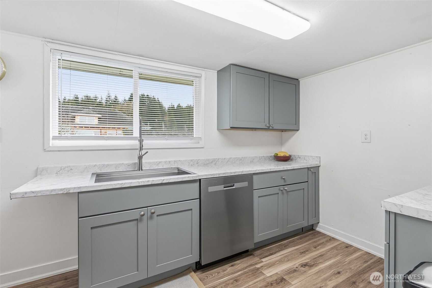 180 2nd Street Cathlamet, WA 98612 - Photo 21 of 40 a kitchen with a sink cabinets and window