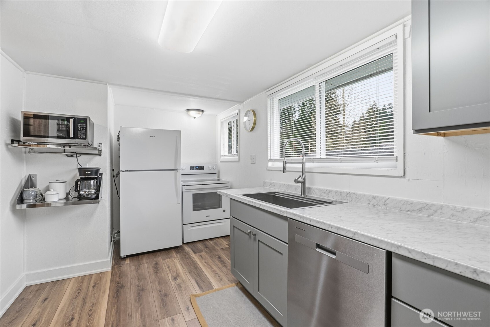 180 2nd Street Cathlamet, WA 98612 - Photo 22 of 40 a kitchen with a refrigerator and a sink