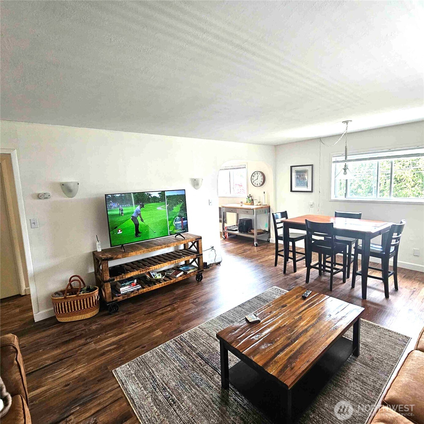 180 2nd Street Cathlamet, WA 98612 - Photo 27 of 40 a living room with furniture a flat screen tv and a large window