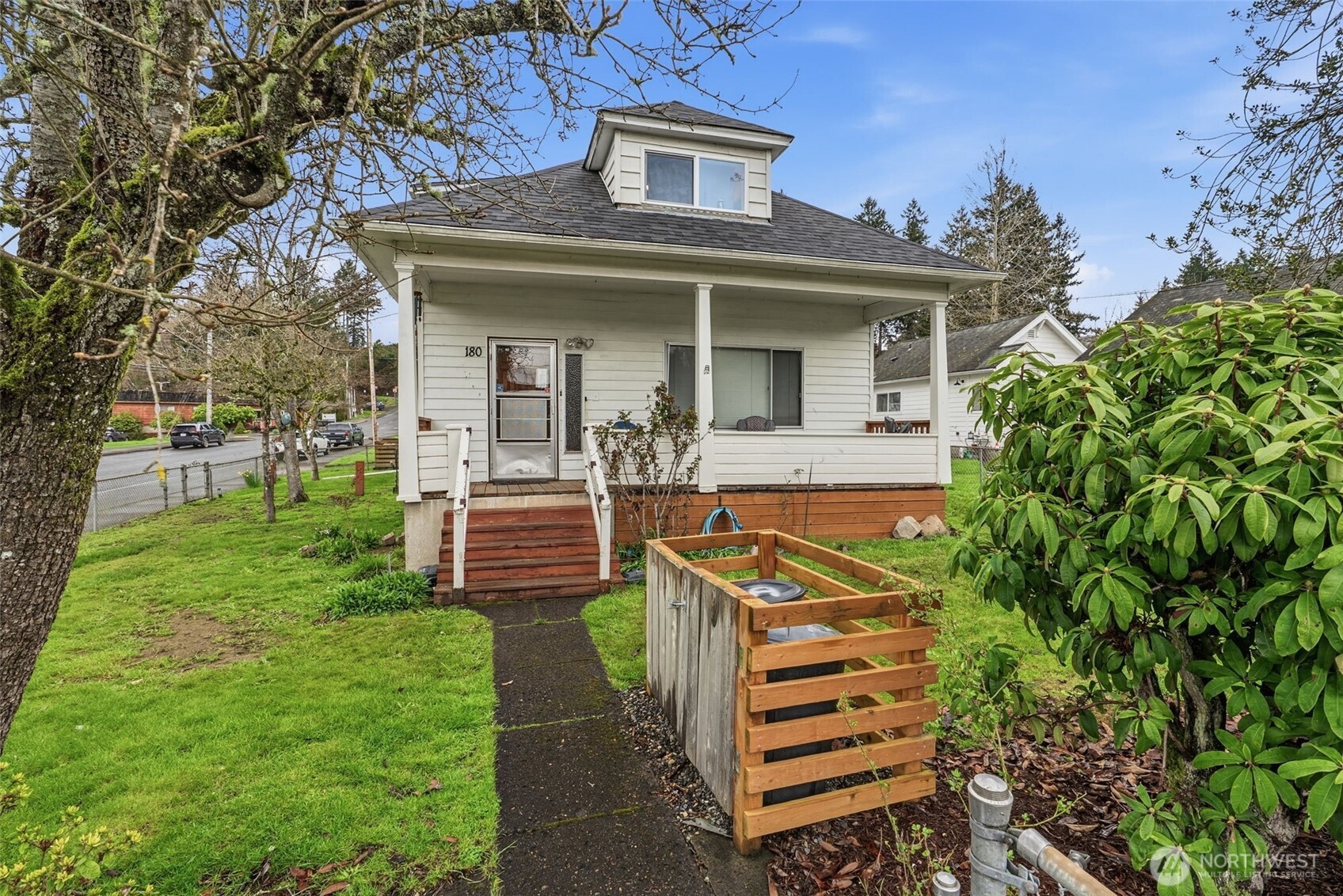 180 2nd Street Cathlamet, WA 98612 - Photo 3 of 40 a view of a house with a yard