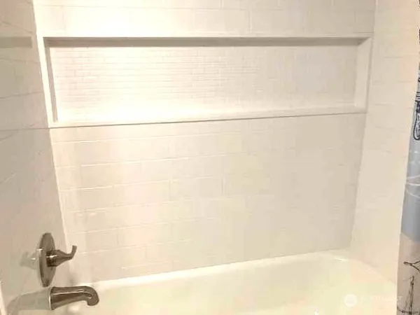 a bathroom with a bathtub