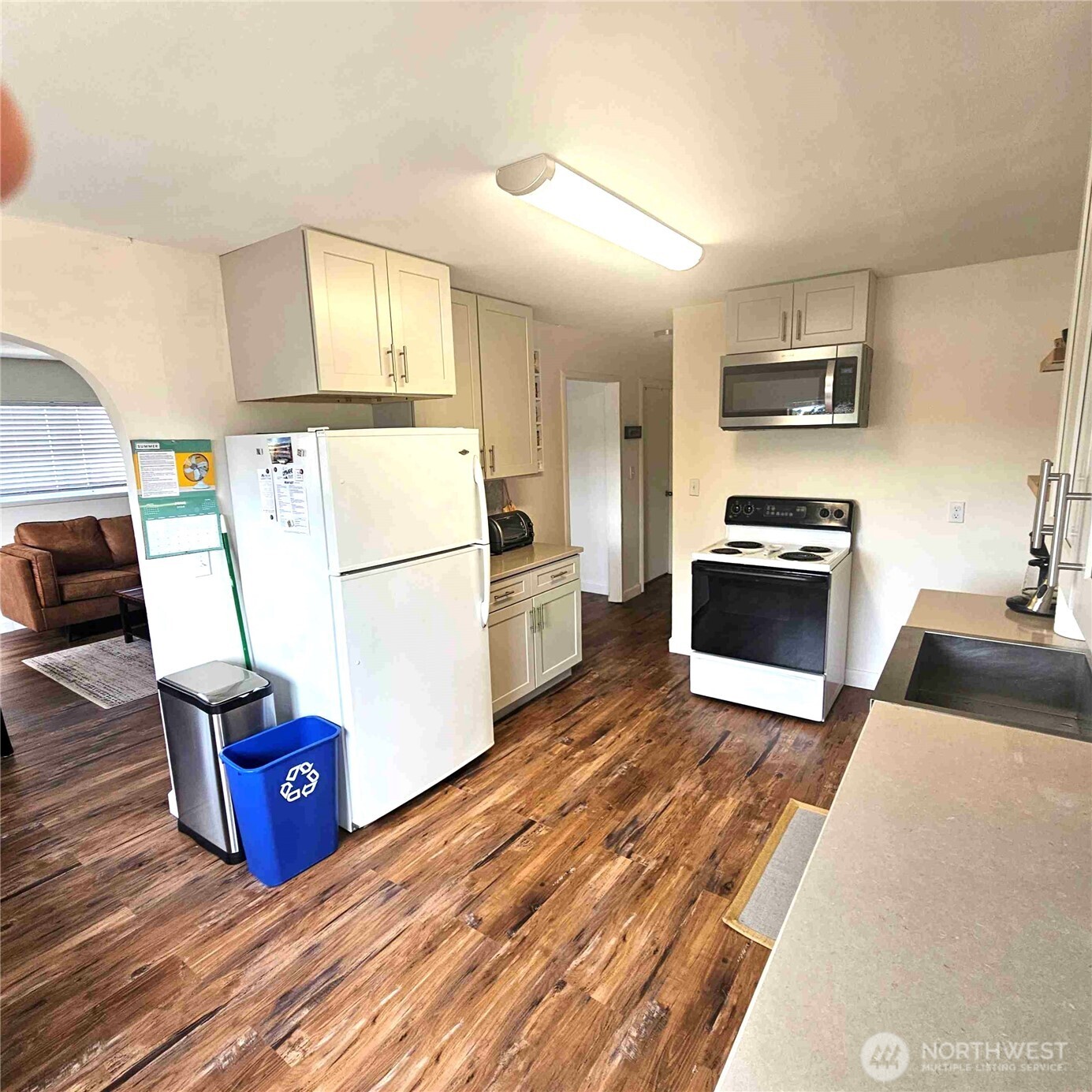 180 2nd Street Cathlamet, WA 98612 - Photo 33 of 40 a kitchen with sink refrigerator and stove