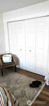 a bathroom with a sink and a window