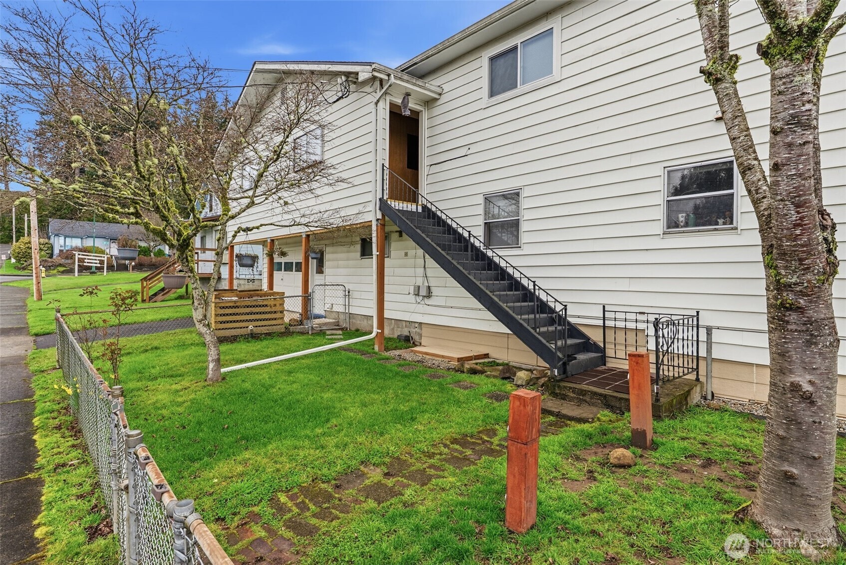 180 2nd Street Cathlamet, WA 98612 - Photo 4 of 40 a view of a house with backyard
