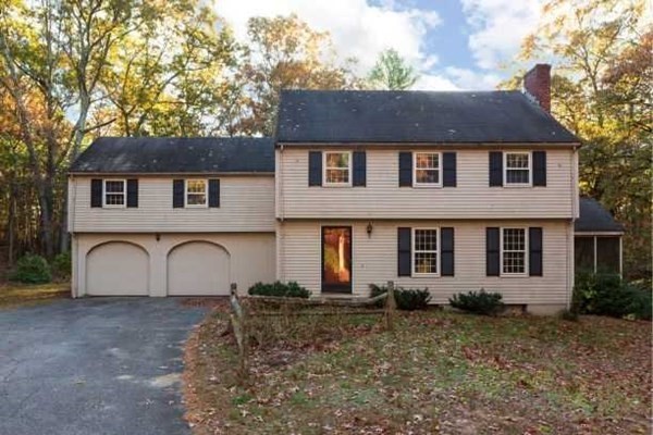 555 Heald Road Carlisle, MA 01741 - Photo 1 of 22 a front view of a house with garden