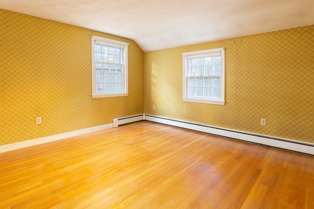 555 Heald Road Carlisle, MA 01741 - Photo 13 of 22 a view of an empty room with a window and closet