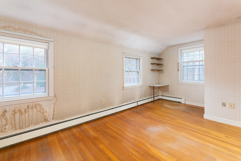 555 Heald Road Carlisle, MA 01741 - Photo 14 of 22 an empty room with windows