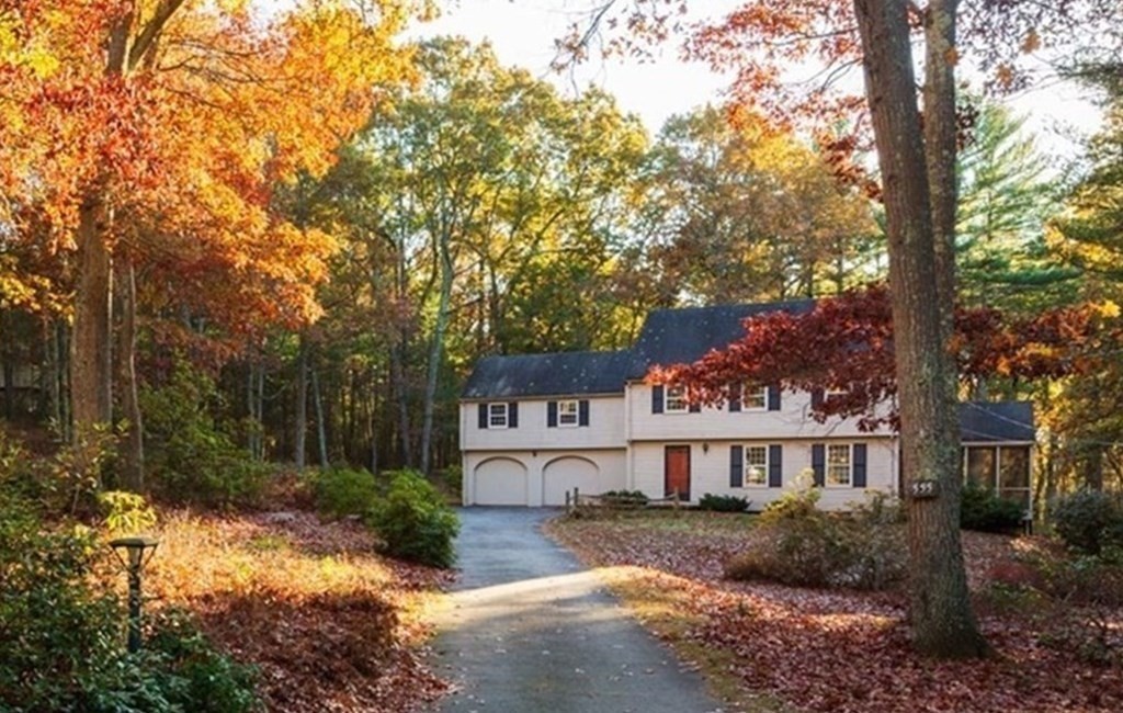 555 Heald Road Carlisle, MA 01741 - Photo 19 of 22 a front view of a house with a garden