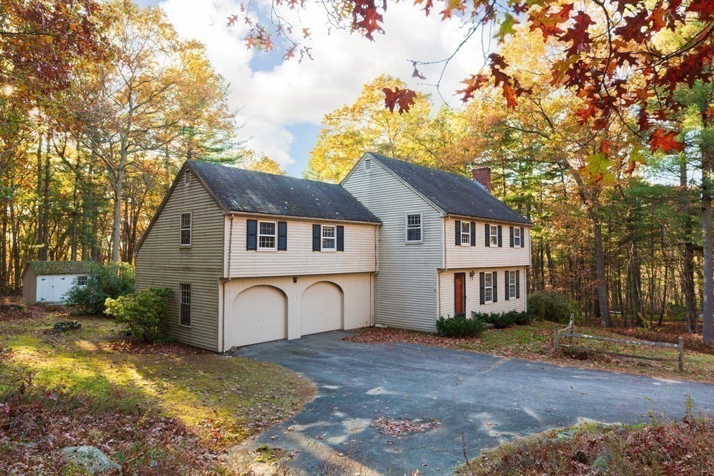 555 Heald Road Carlisle, MA 01741 - Photo 2 of 22 a view of house with a yard