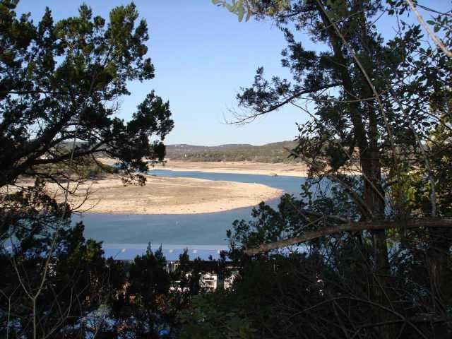 a view of an ocean and a mountain