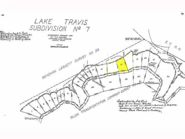 a picture of a book and a white wall