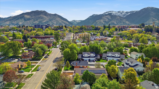 560 East 700 North Logan, UT 84321 - Photo 29 of 32 Residential neighborhood featuring a diverse collection of homes, mature trees, and paved streets