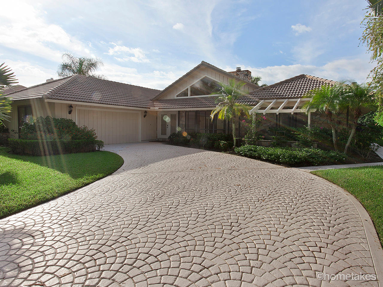 69 Dunbar Road Palm Beach Gardens, FL 33418 - Photo 2 of 21 Front yard