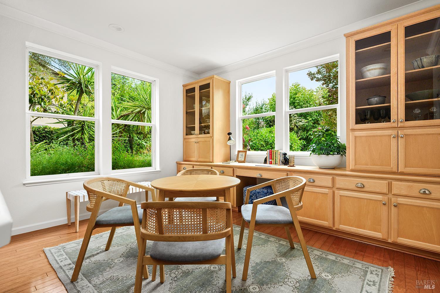 38 Maybeck Street Novato, CA 94949 - Photo 18 of 47 a view of a dining room that has a table and chairs in it