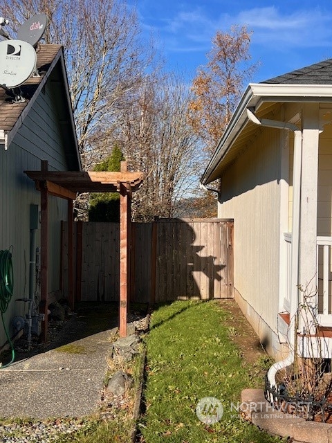 443 Spring Lane Sedro-Woolley, WA 98284 - Photo 30 of 34 a backyard of a house with yard and outdoor seating