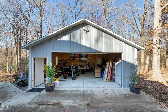 a view of a roof deck with furniture