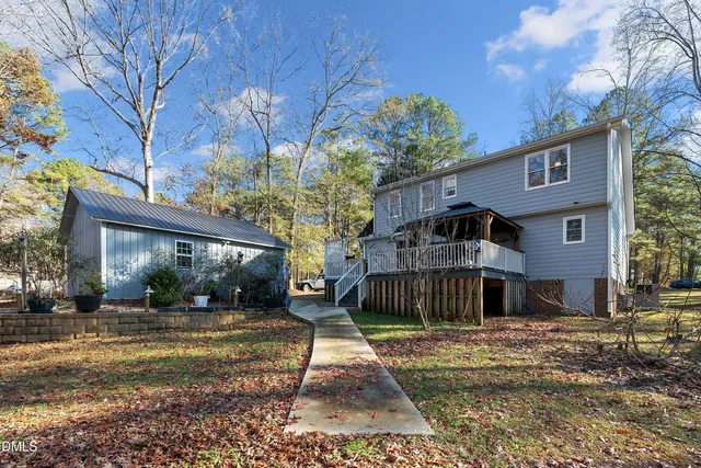 a backyard of a house with lots of green space