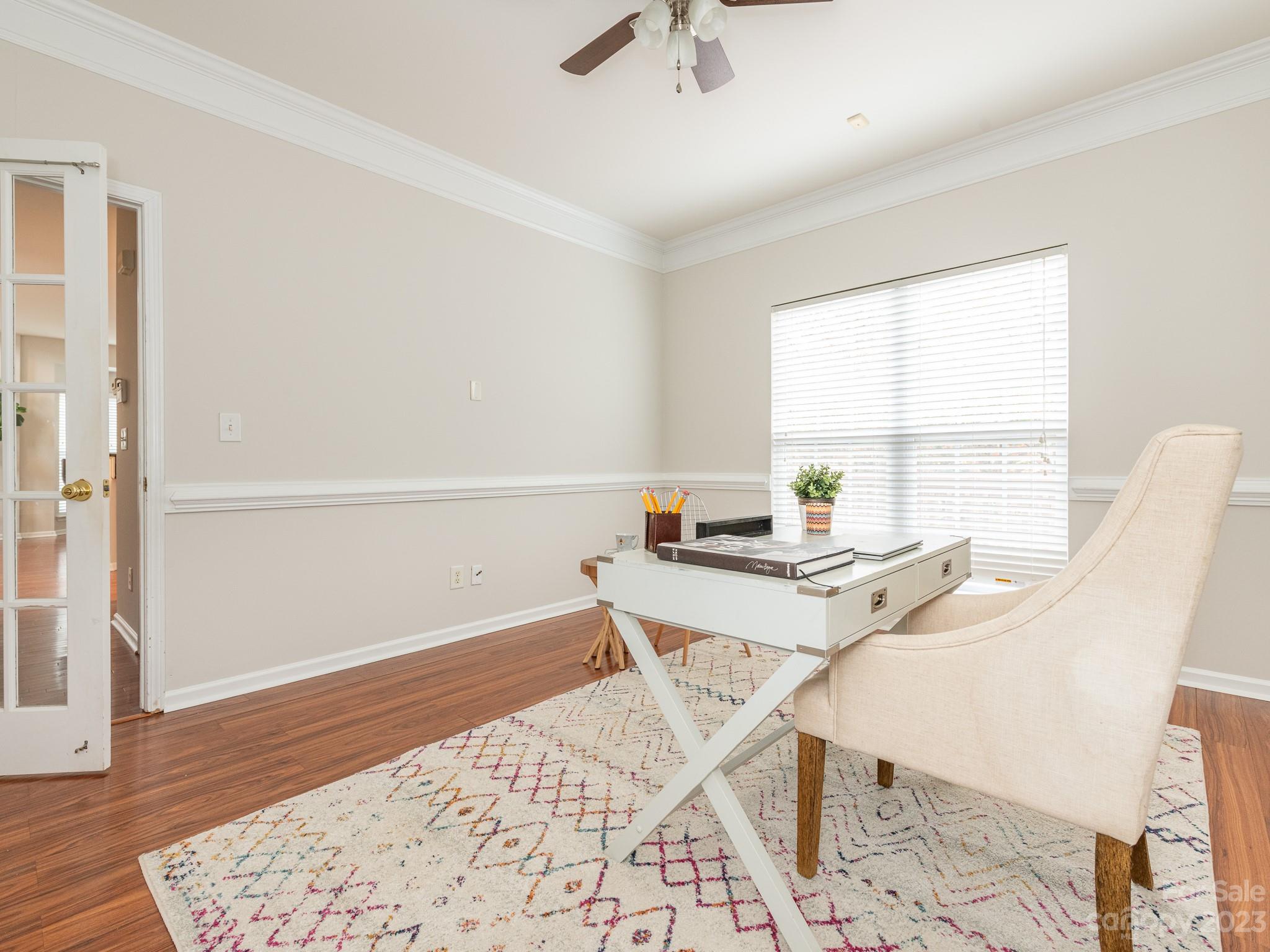 3764 Leela Palace Way Fort Mill, SC 29708 - Photo 15 of 32 a view of a workspace with furniture and wooden floor