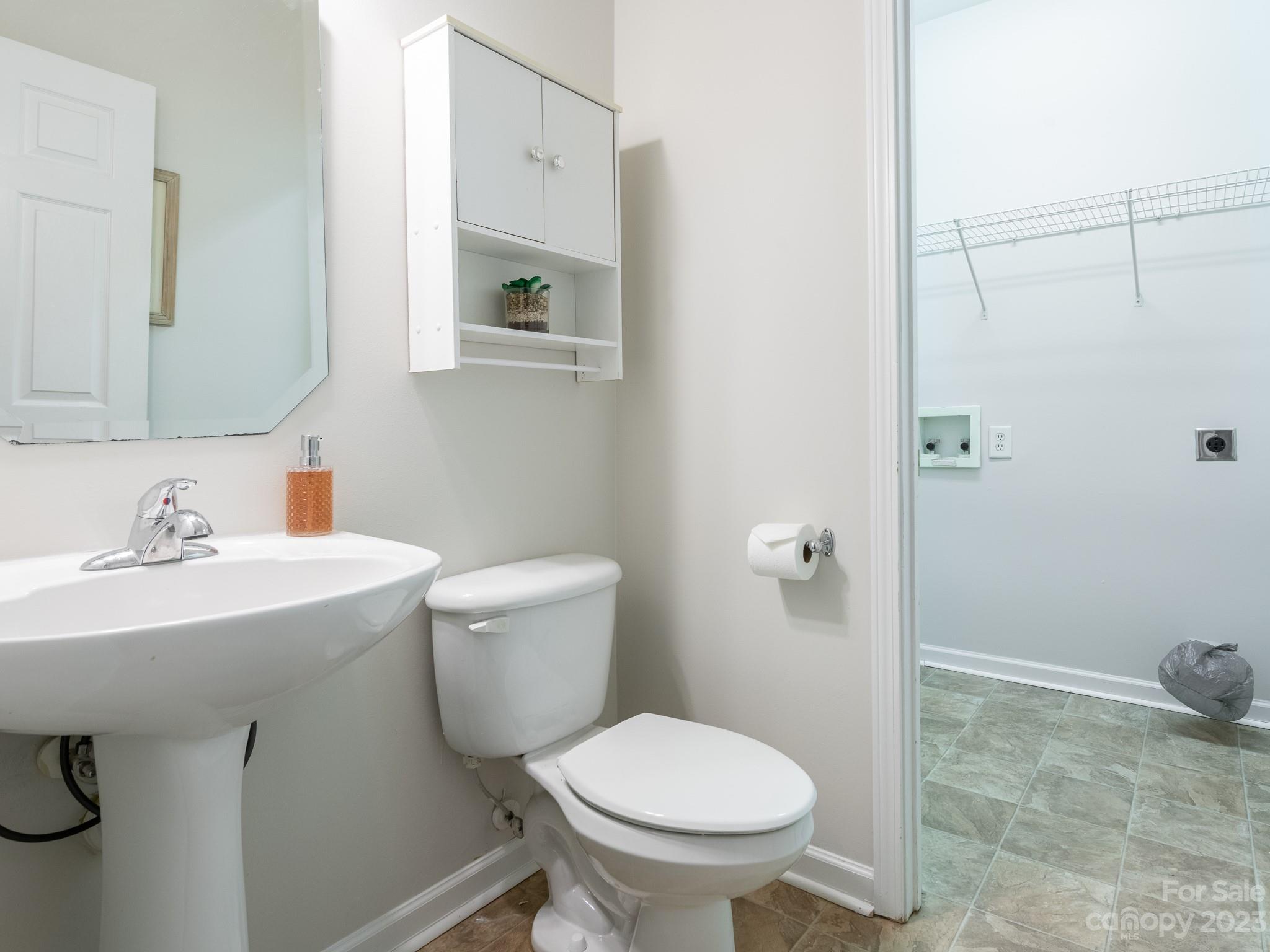 3764 Leela Palace Way Fort Mill, SC 29708 - Photo 16 of 32 a bathroom with a sink toilet and shower