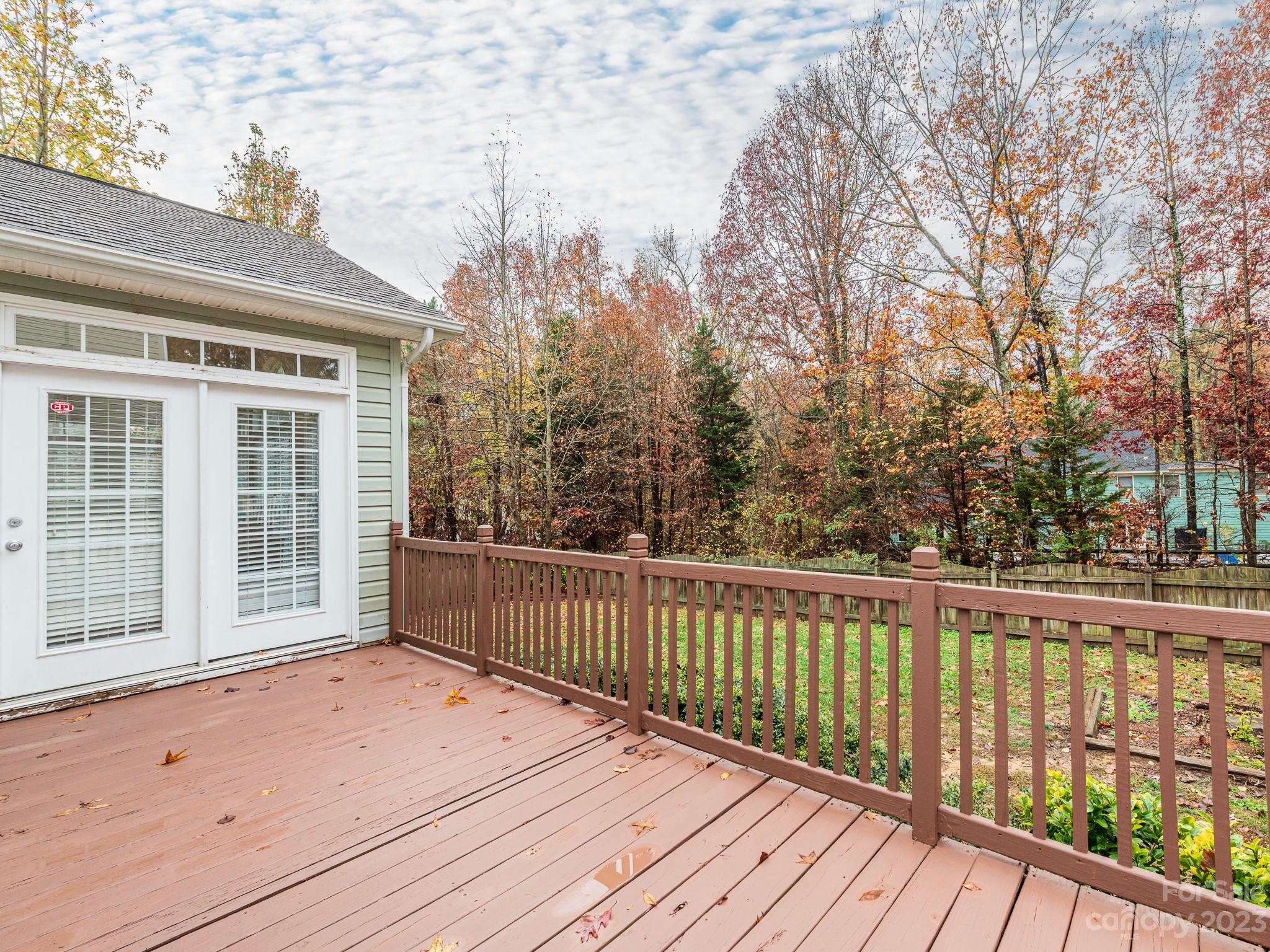 3764 Leela Palace Way Fort Mill, SC 29708 - Photo 29 of 32 a view of a wooden balcony with an outdoor space