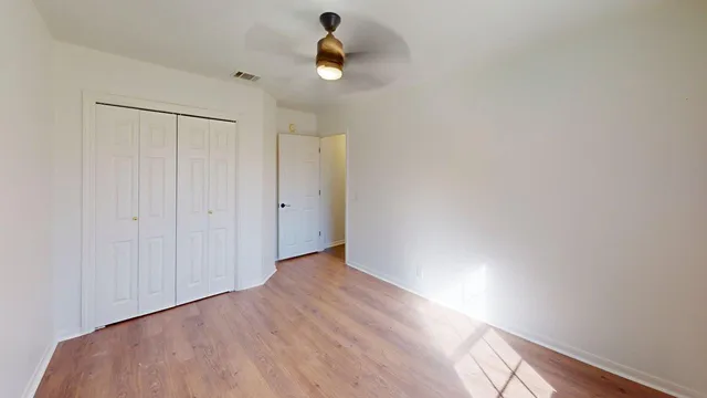 a view of an empty room and window