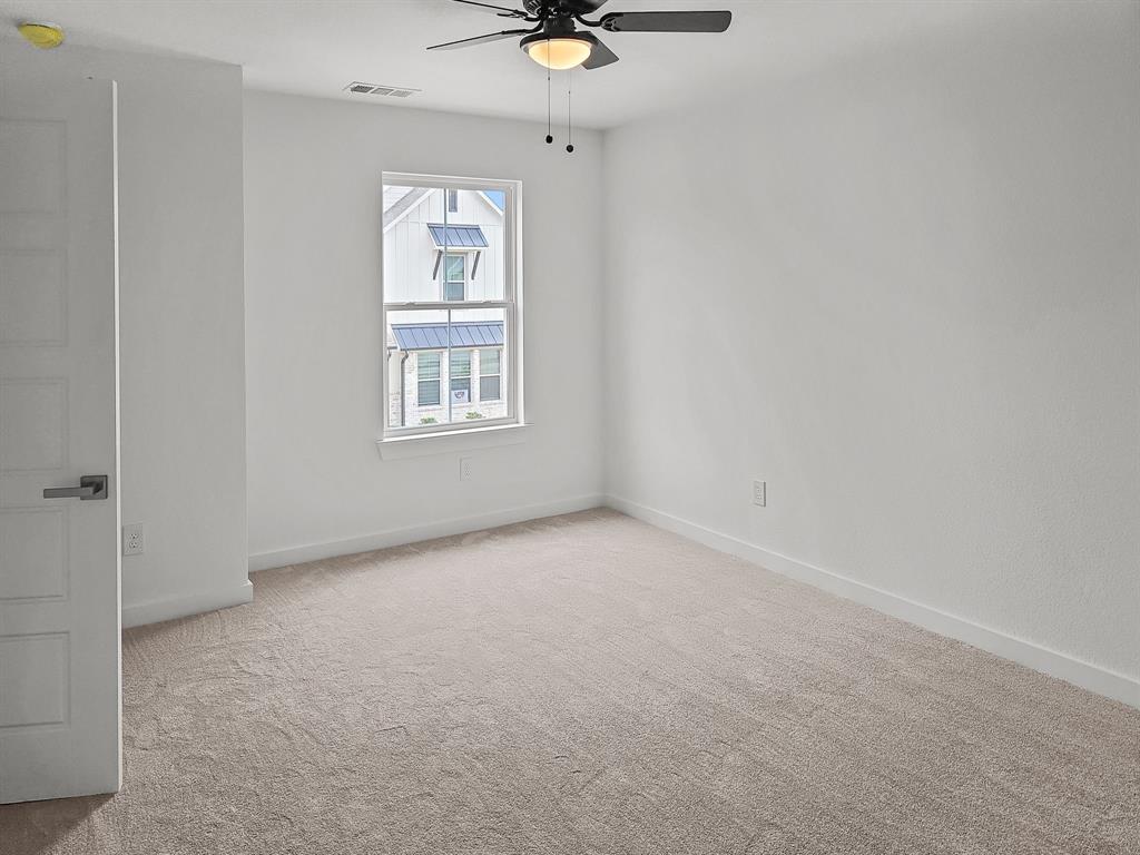 9565 Thorncrown Lane Fort Worth, TX 76179 - Photo 17 of 25 an empty room with a window