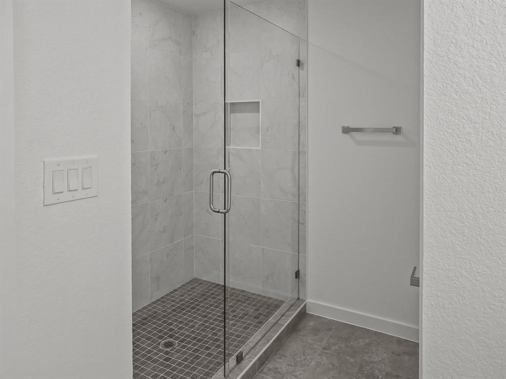 9565 Thorncrown Lane Fort Worth, TX 76179 - Photo 23 of 25 a bathroom with a shower