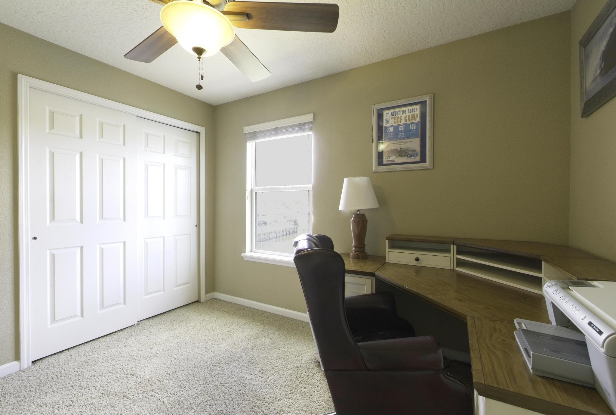 167 Islander Drive St. Augustine, FL 32080 - Photo 18 of 34 a living room with furniture and a window