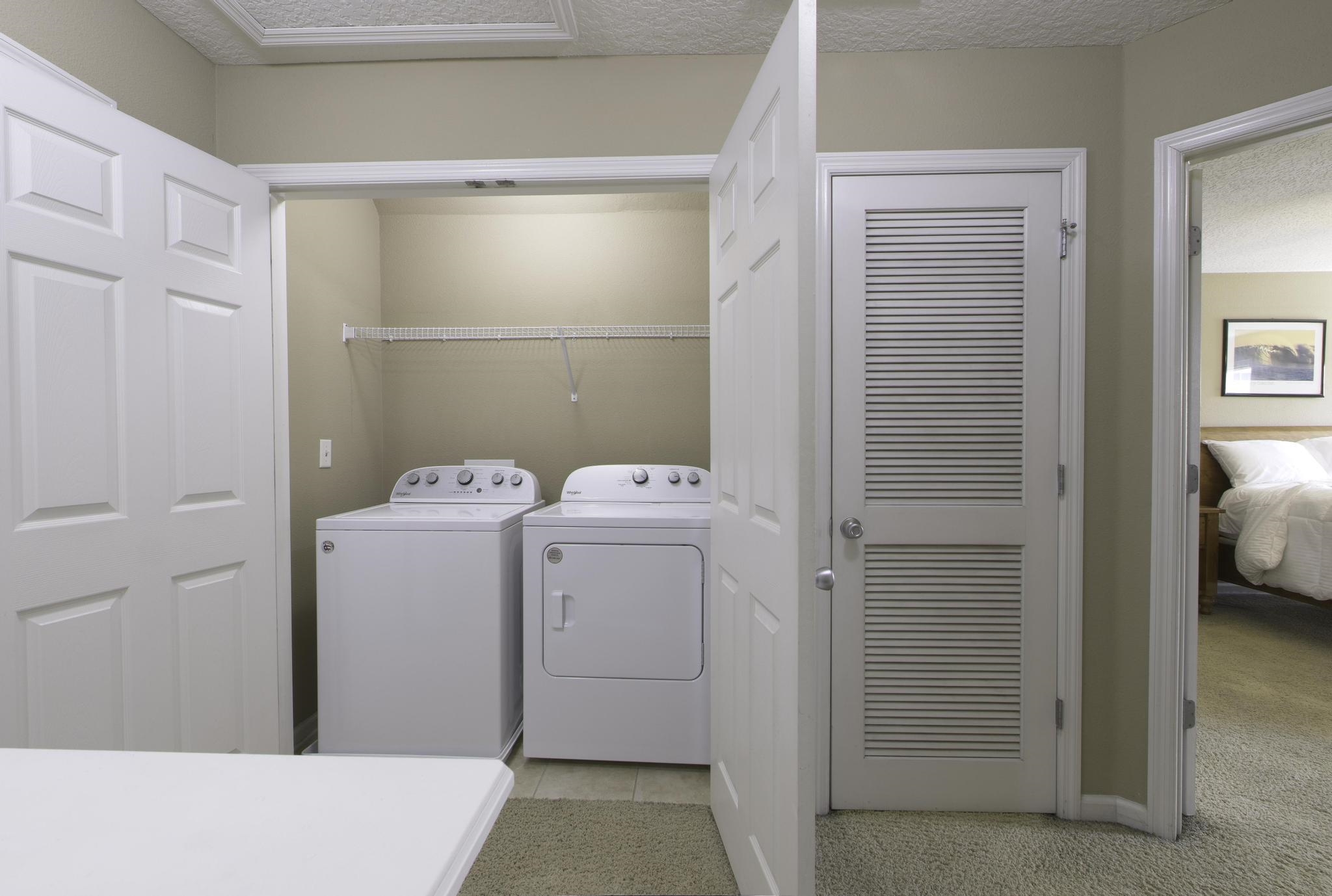 167 Islander Drive St. Augustine, FL 32080 - Photo 21 of 34 a utility room with dryer and washer