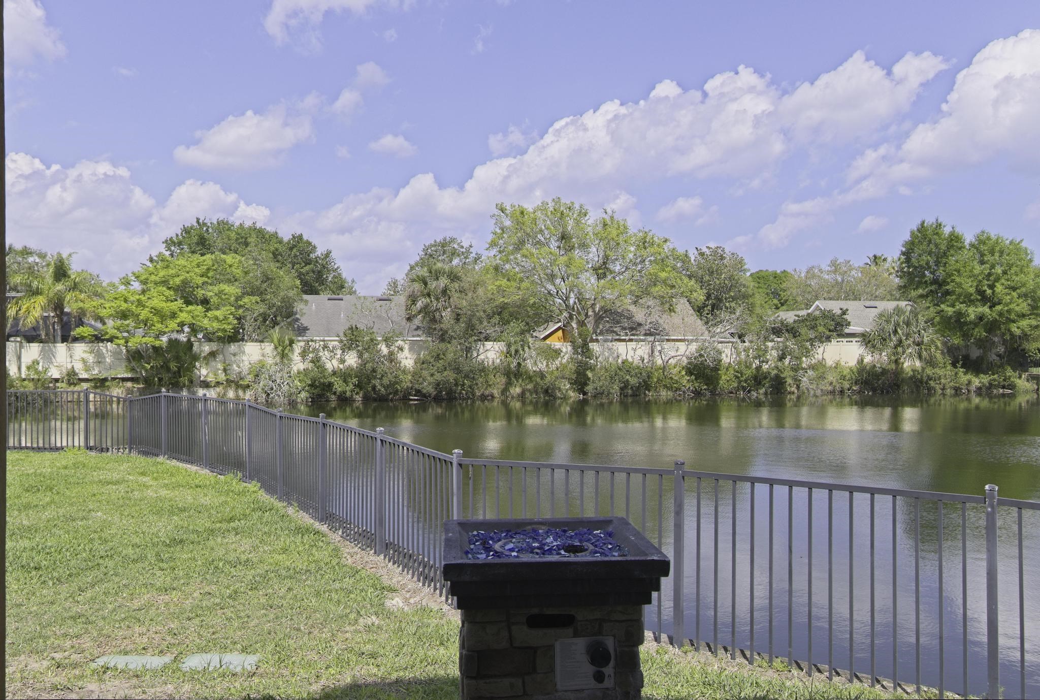 167 Islander Drive St. Augustine, FL 32080 - Photo 25 of 34 a view of a lake from a balcony