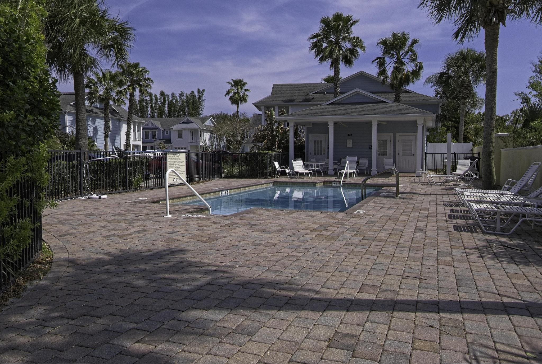 167 Islander Drive St. Augustine, FL 32080 - Photo 28 of 34 a view of a house with backyard and sitting area