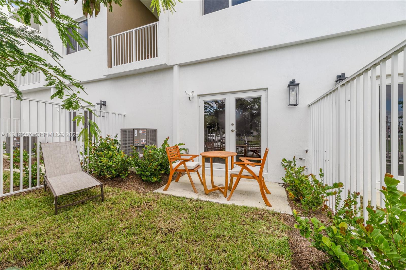 355 Northwest 30th Avenue, Unit 1311 Pompano Beach, FL 33069 - Photo 11 of 19 a house view with a seating space