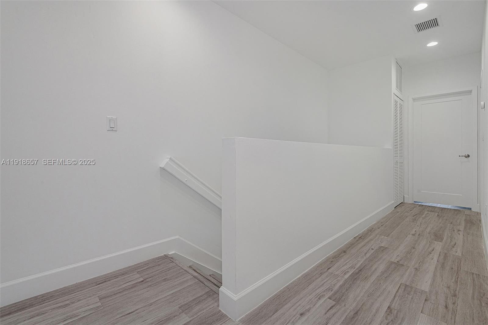 355 Northwest 30th Avenue, Unit 1311 Pompano Beach, FL 33069 - Photo 14 of 19 a view of small space with wooden floor