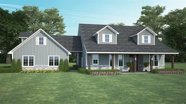 a front view of house with yard and green space