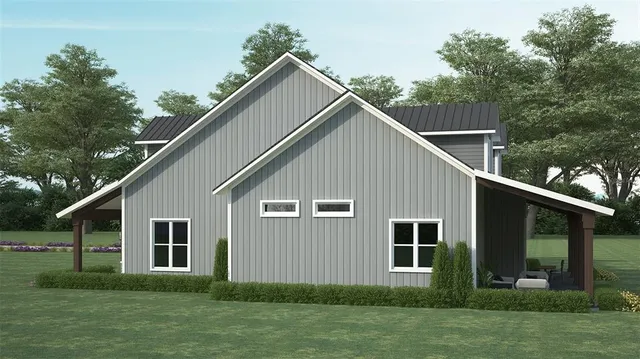 a view of a house with backyard