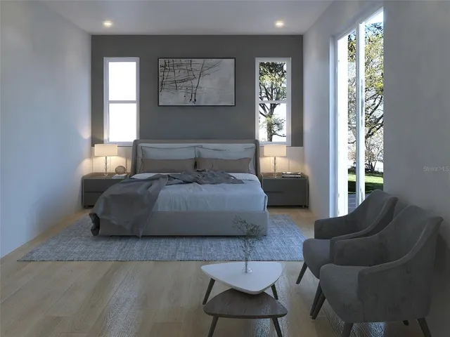 a bedroom with a bed and window