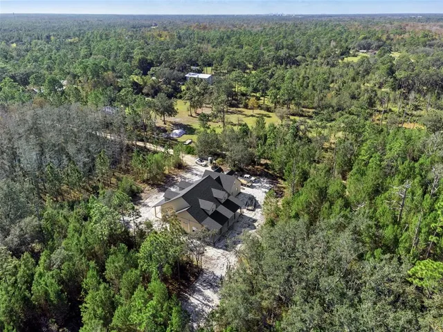 $1,250,000 | 490 Riverwoods Trail, Chuluota, FL 32766